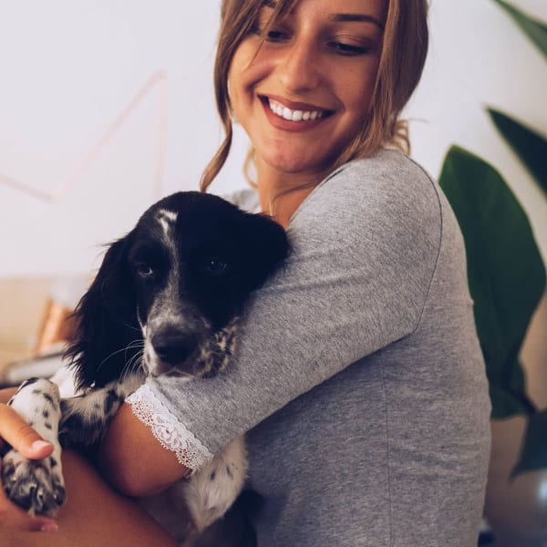 Resident and her dog at The M at Shadow Mountain in Phoenix, Arizona