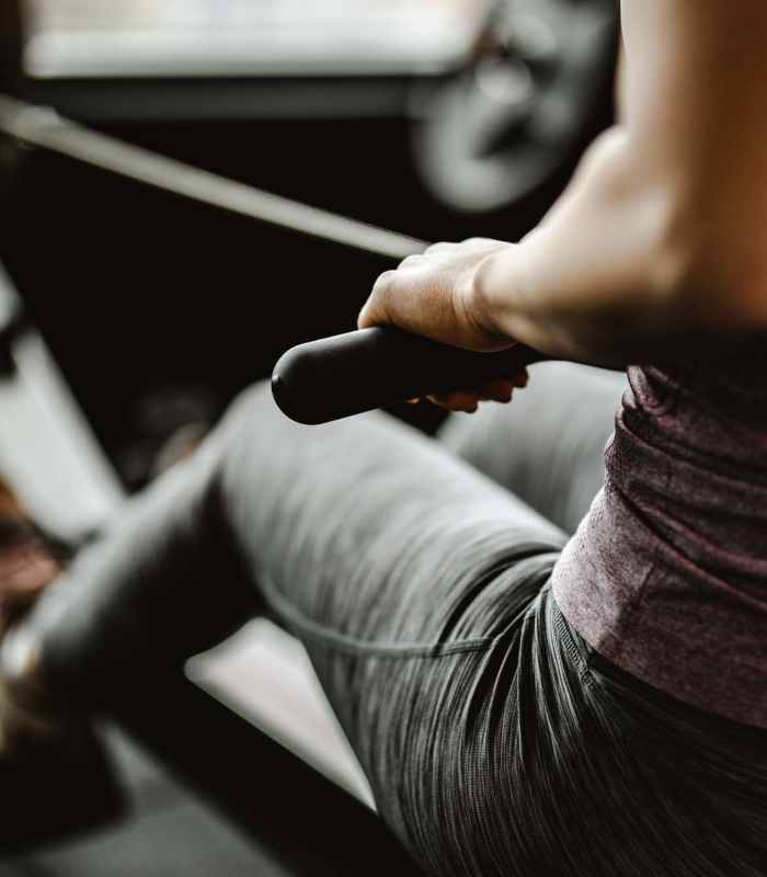 Resident working out in the gym at Saddlebrook Apartments in Murfreesboro, Tennessee