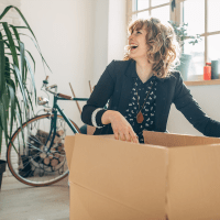 resident unpacking a box at Clark-Whitehill Enterprises, Inc. in Virginia Beach, Virginia