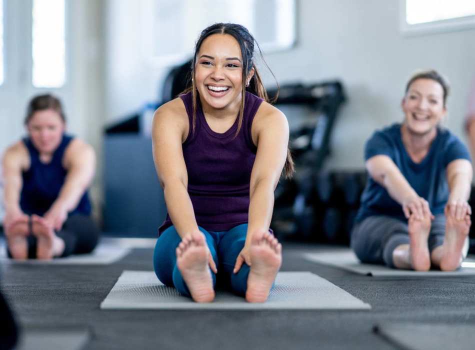 Residents performing yoga at Breckinridge Point Apartments in Richardson, Texas