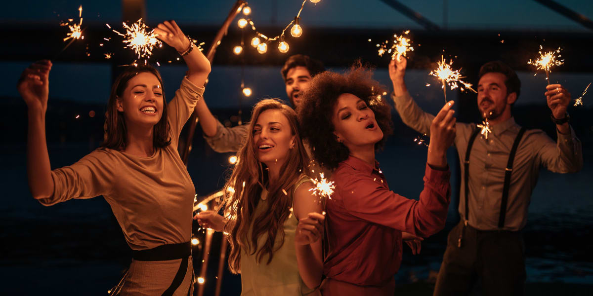 Friends with sparklers at Civic Lofts in Denver, Colorado