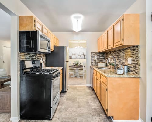 Fully equipped kitchen at Montgomery Trace Apartment Homes in Silver Spring, Maryland