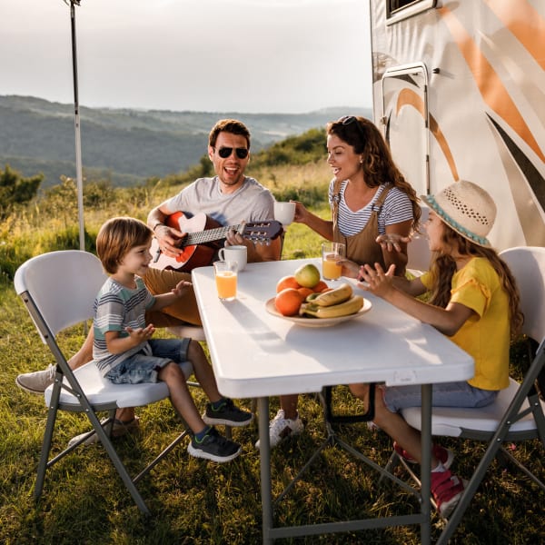 A family with an RV near BlueGate Boat & RV - Conroe in Conroe, Texas