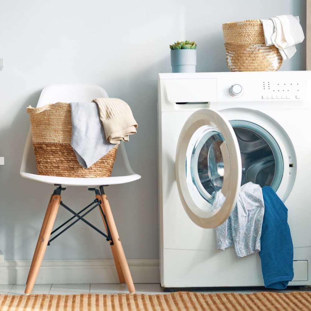 In-home washer and dryer at Pine Tree Apartments in Winston, Oregon