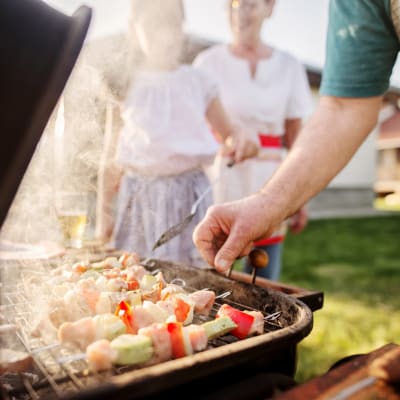 Grilling food at a community event at Carpenter Park in Patuxent River, Maryland