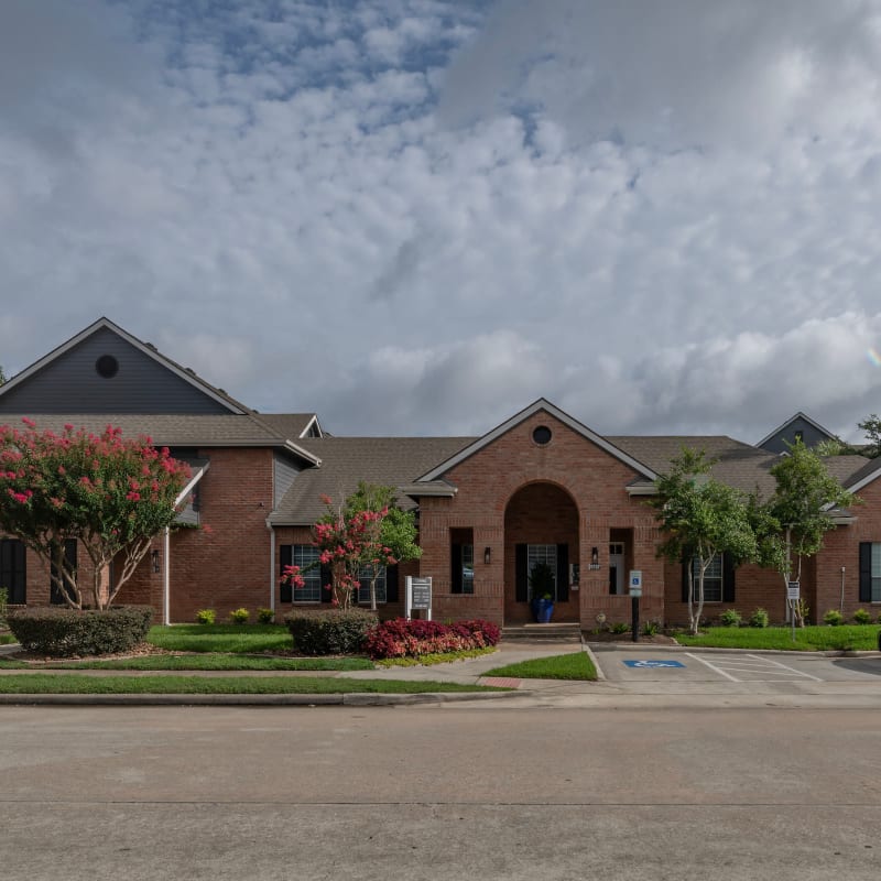 Exterior of the leasing office at Compass at Windmill Lakes in Houston, Texas