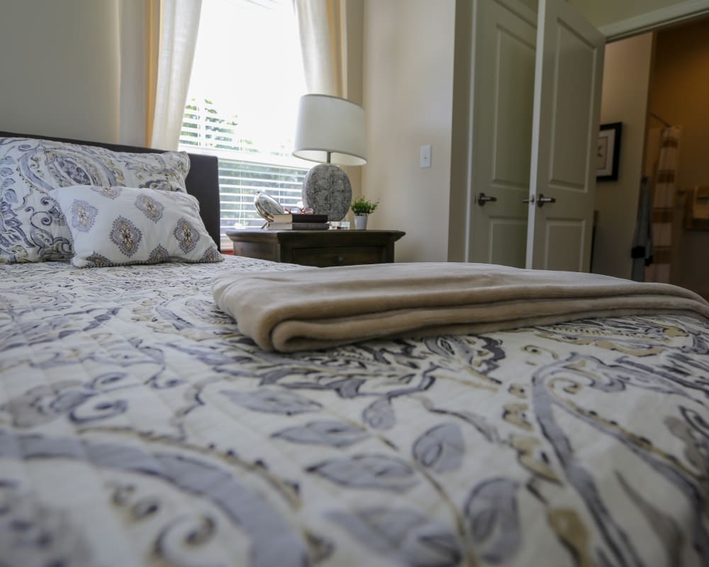 A decorated bedroom at Harmony at Martinsburg in Martinsburg, West Virginia