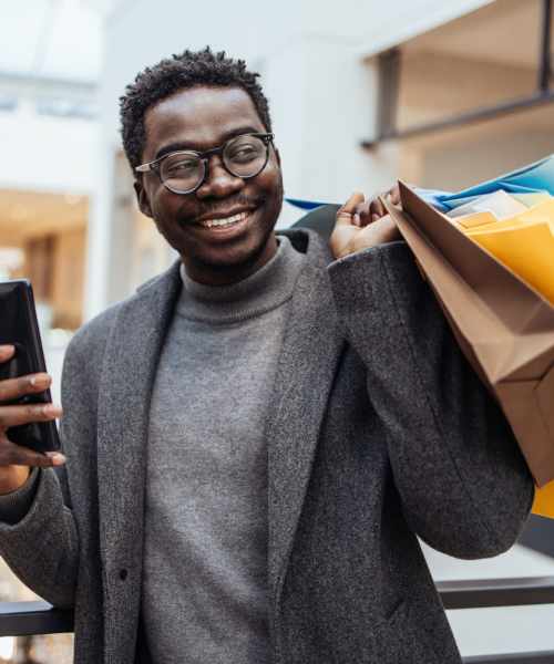 Resident buying clothes in a local shopping mall near Edge DTC in Denver, Colorado
