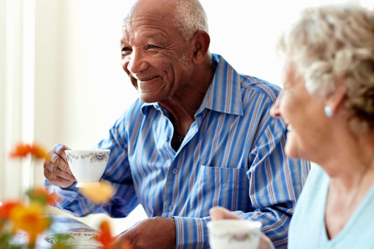 Two residents enjoying tea at The Oxford Grand Assisted Living & Memory Care in Wichita, Kansas