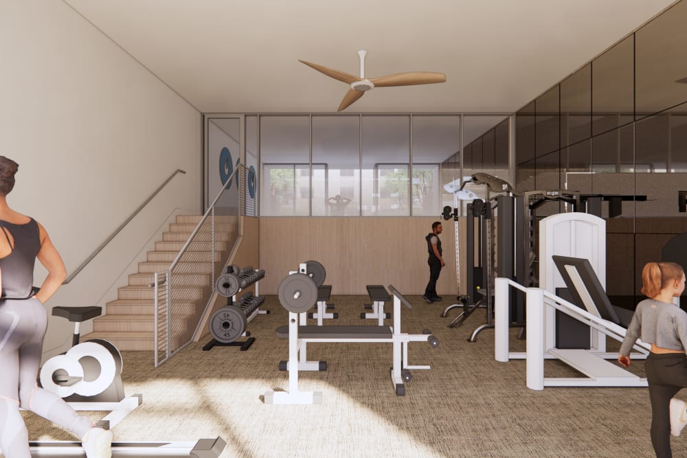 Gym with treadmill and weights at Dolphin Marina Apartments in Marina Del Rey, California