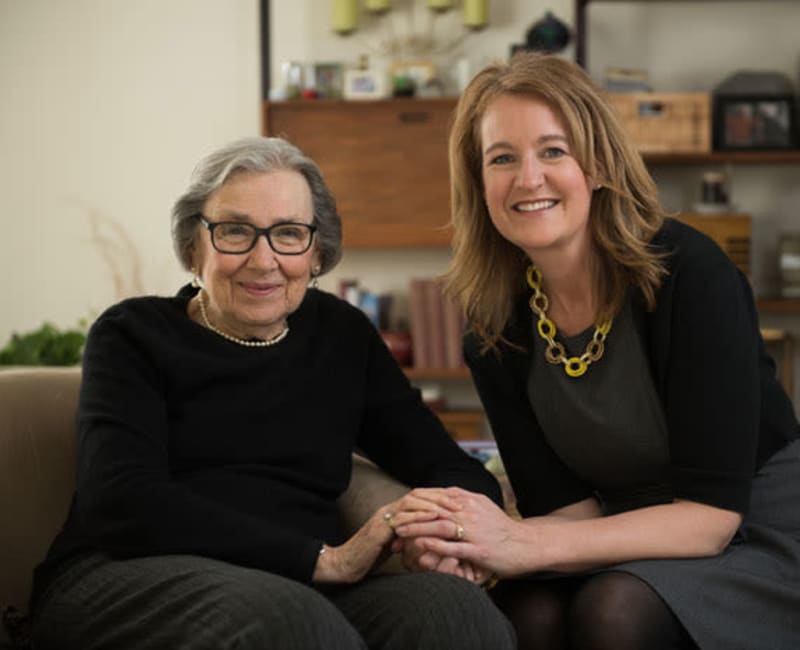 A resident and staff member pose for a picture at Ebenezer Ridges Campus in Burnsville, Minnesota 