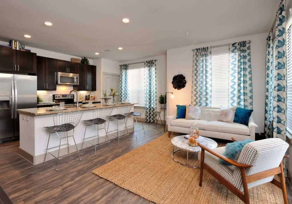 Living room and kitchen view at Harmony Park in Spring, Texas