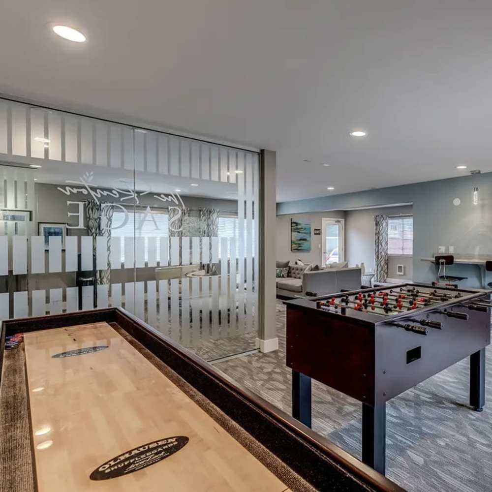Clubhouse with foosball and shuffleboard table at Renton Sage in Renton, Washington