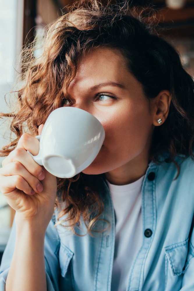Resident having coffee near Filbin Creek in North Charleston, South Carolina