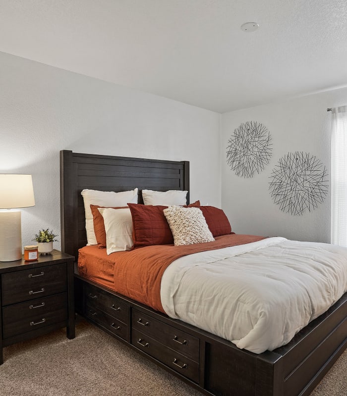 Spacious carpeted bedroom at Acacia Park Apartments in El Paso, Texas