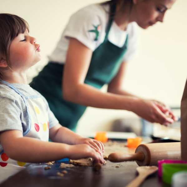 Mother and daughter bake cookies at The Carlton at Greenbrier, Chesapeake, Virginia