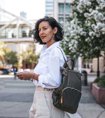 Resident woman going for university near Walnut Apartments in Philadelphia, Pennsylvania