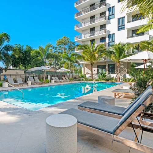 The resort-style swimming pool at The Vibe Miami Apartments in Miami, Florida