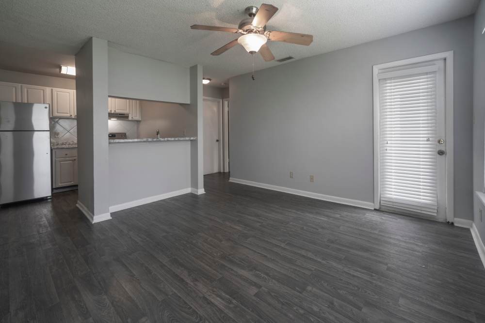 Unfurnished Living room with access to other apartment room at Isles at East Millenia in Orlando, Florida