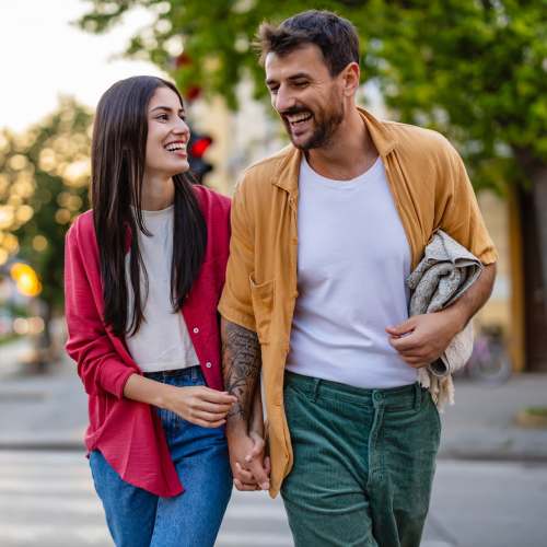 Resident couple walking at Broadway Crossing Apartments in Merrillville, Indiana