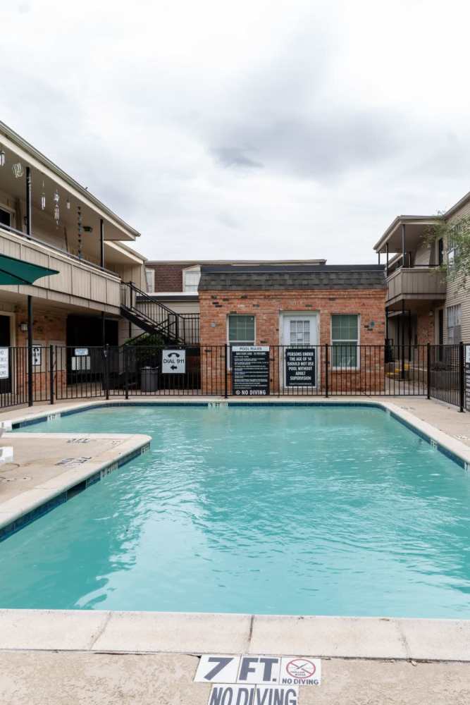 Shimmery swimming pool at Arbor Park Apartments in Hurst, Texas
