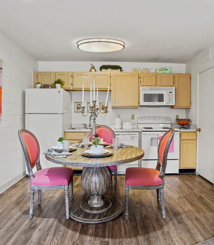 Dining area with kitchen at back at The Phoenix Apartments in El Paso, Texas