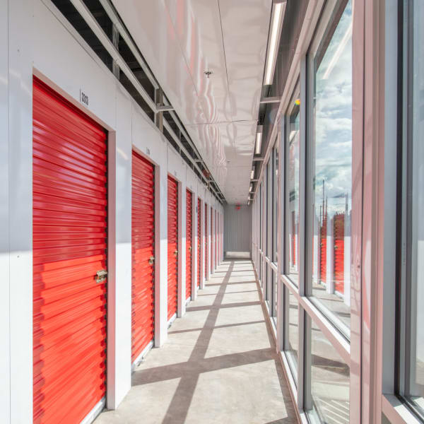Climate-controlled units with red doors at StorQuest Self Storage in La Quinta, California