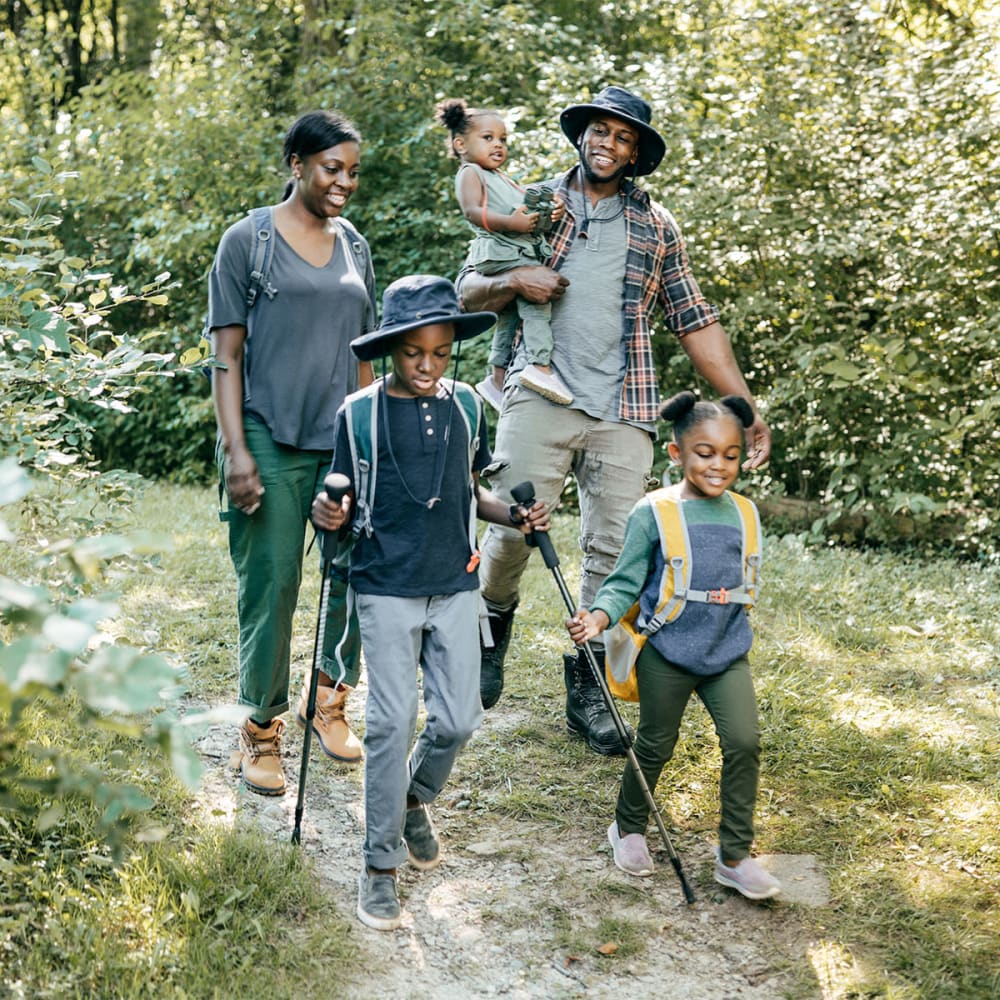 Family enjoying a hike at Steamboat Springs Apartments in Steamboat Springs, Colorado