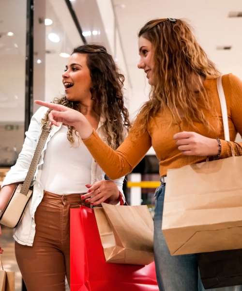 Two women shopping at a mall near Monaco South in Denver, Colorado