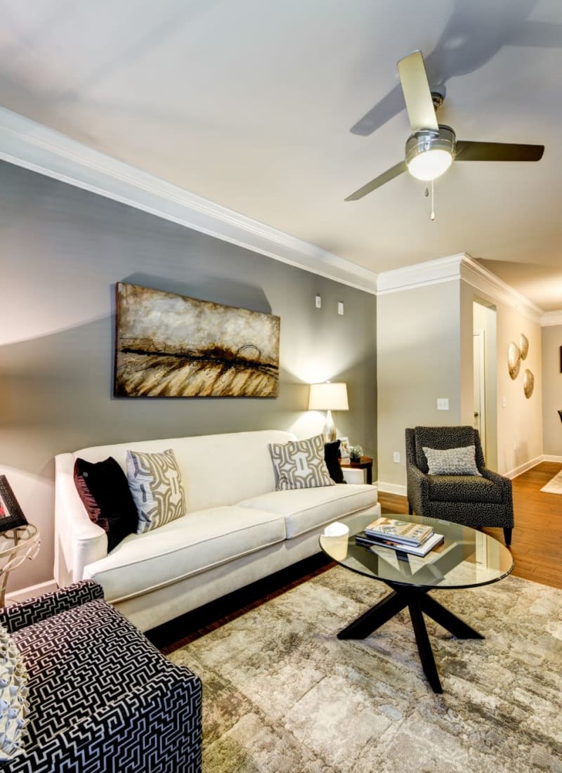 Modern and comfortable living room at Marquis at Morrison Plantation in Mooresville, North Carolina