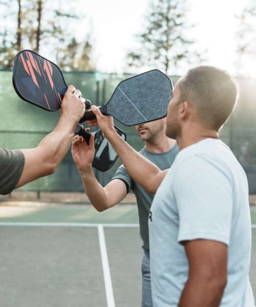 Residents playing badminton near Emerald Palms in Miami, Florida
