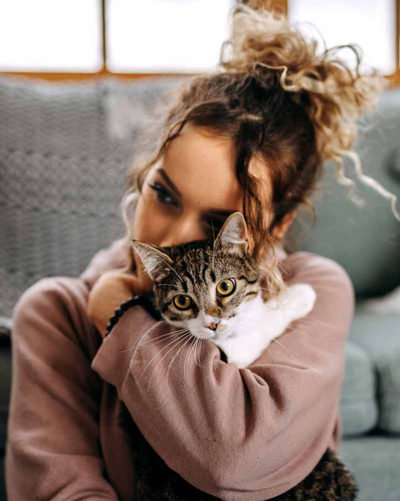 Resident and her cat at Vivo Living Kissimmee in Kissimmee, Florida