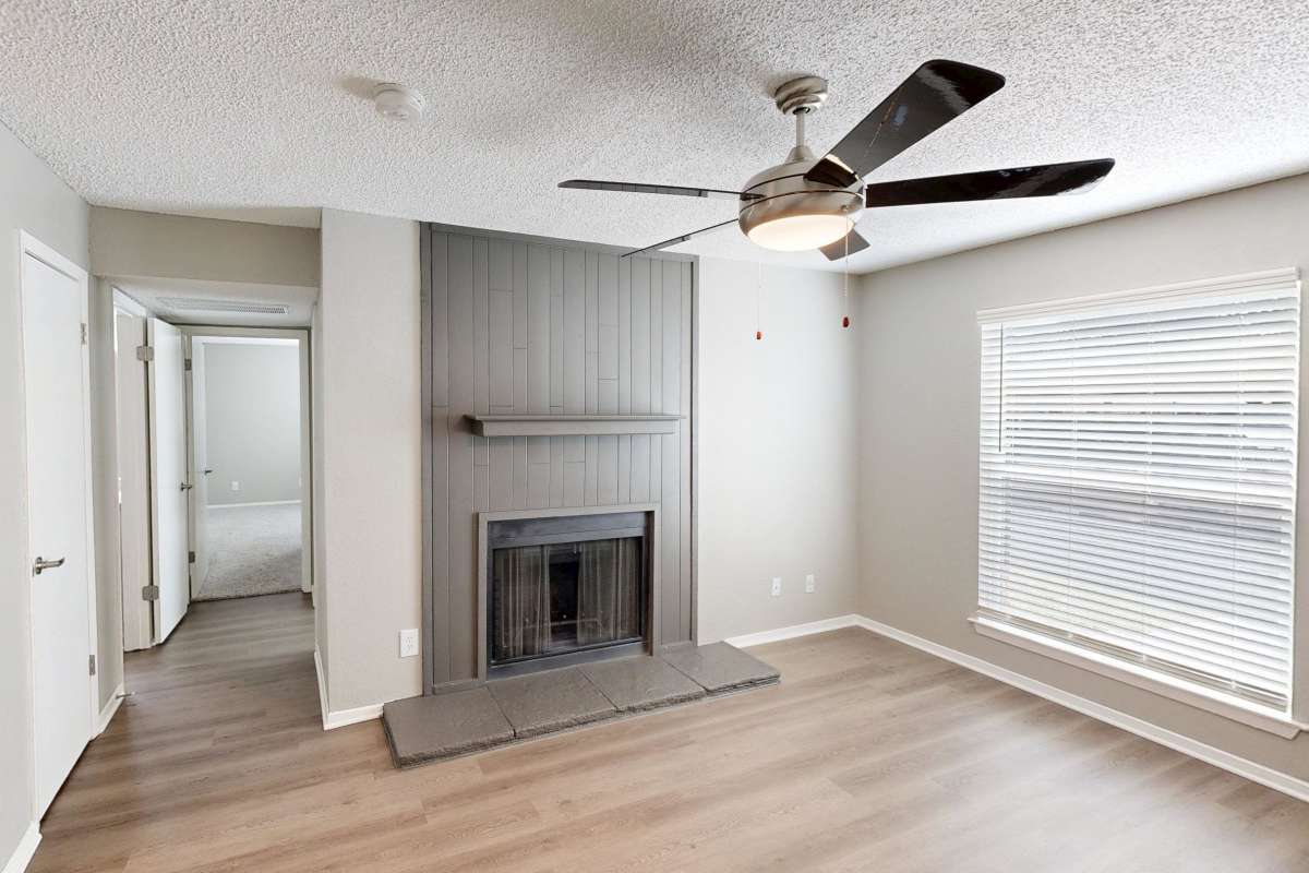 Resident living space with a fireplace at Creekside in San Angelo, Texas