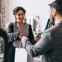 Residents buying clothes at a shopping mall near at Montage | Rocky Hill in Rocky Hill, Connecticut