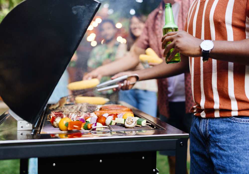 Resident grilling veggies on the barbecue at The Element At 464 in Daytona Beach, Florida