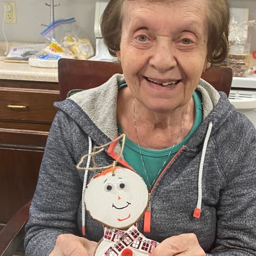 Two residents painting at Saunders House in Wahoo, Nebraska