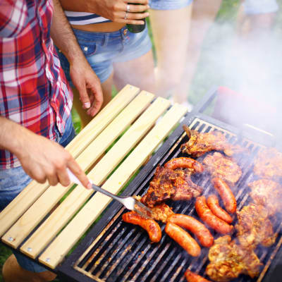 Residents grilling food during an event at Eagleview in Joint Base Lewis McChord, Washington