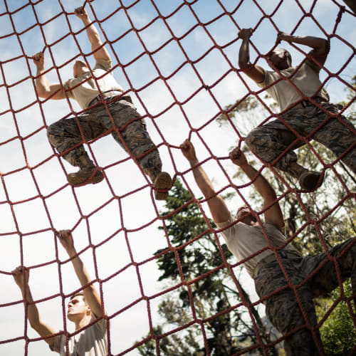 Residents exercising on a net near Joshua Heights in Twentynine Palms, California