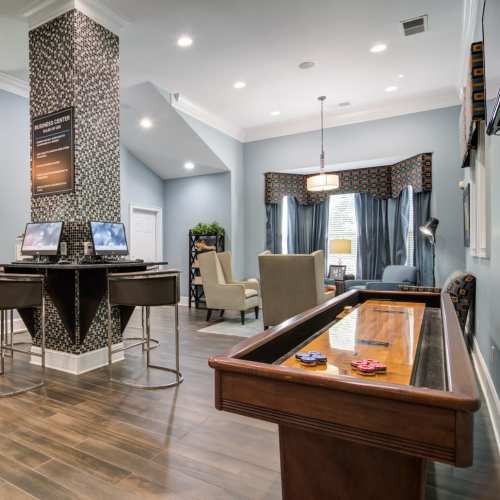 Game lounge at at Estates at McDonough Apartment Homes in McDonough, Georgia