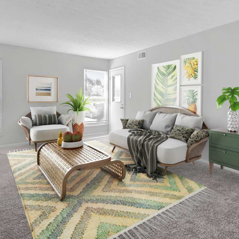 Spacious living room with a comfortable couch and a coffee table at Eden at Jefferson Crossing in Columbus, Ohio