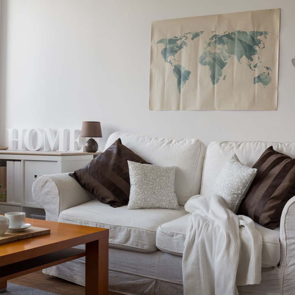 Living room with sofa at Grandview Garden Apartments in Florissant, Missouri