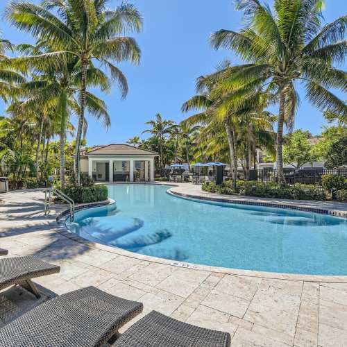 Resort-style swimming pool at {location_name}} in Plantation, Florida