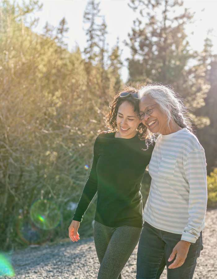 residents walking outside at Clearwater at The Arboretum in Austin, Texas