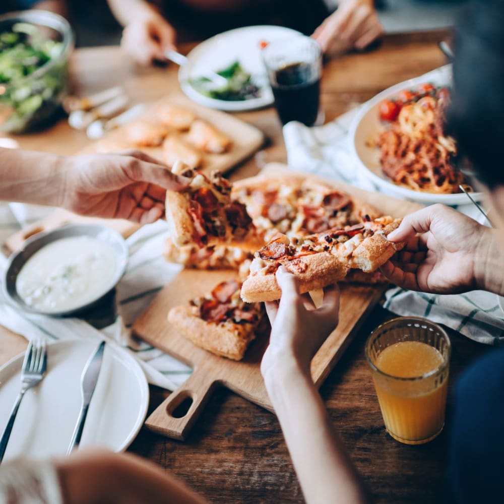 Residents out for pizza near Auburn Villas Senior Apartments in Auburn, California