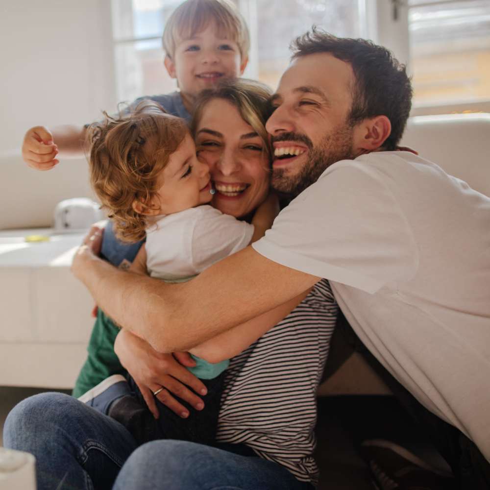 Family in their home at Mission Apartments in San Diego, California