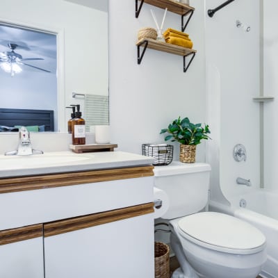 Bathroom with white cabinets at Bayview Hills in San Diego, California
