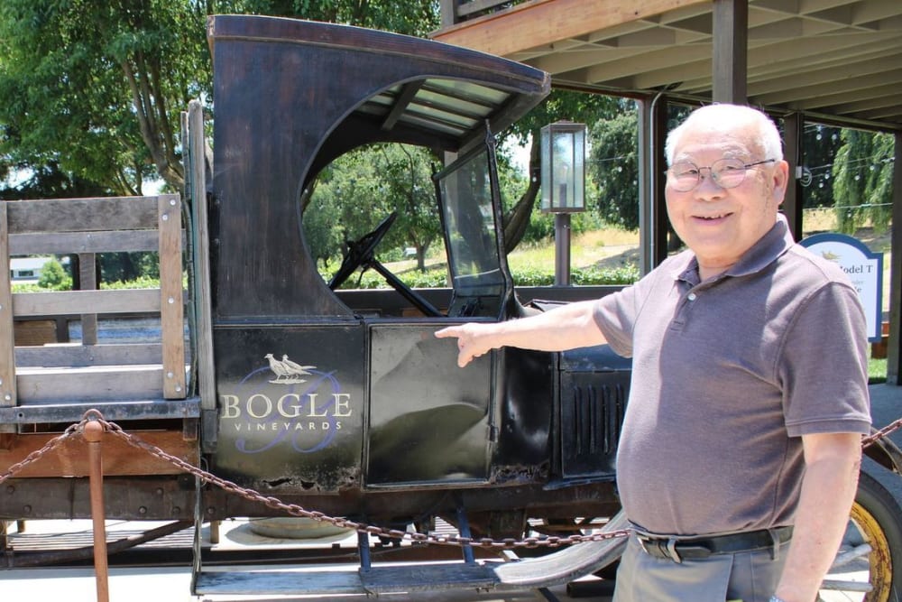 Resident posing for a photo at Campus Commons Senior Living in Sacramento, California