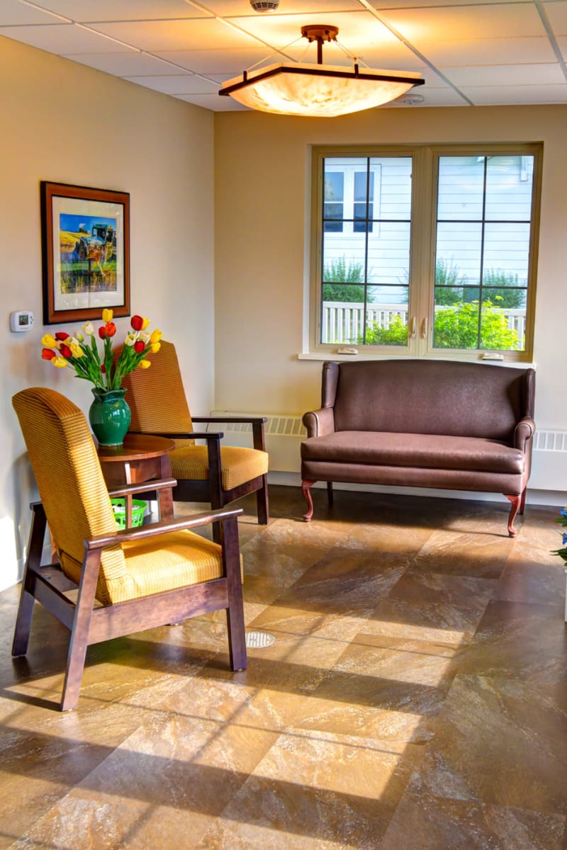 Cozy sitting area with sunshine at Holton Manor in Elkhorn, Wisconsin