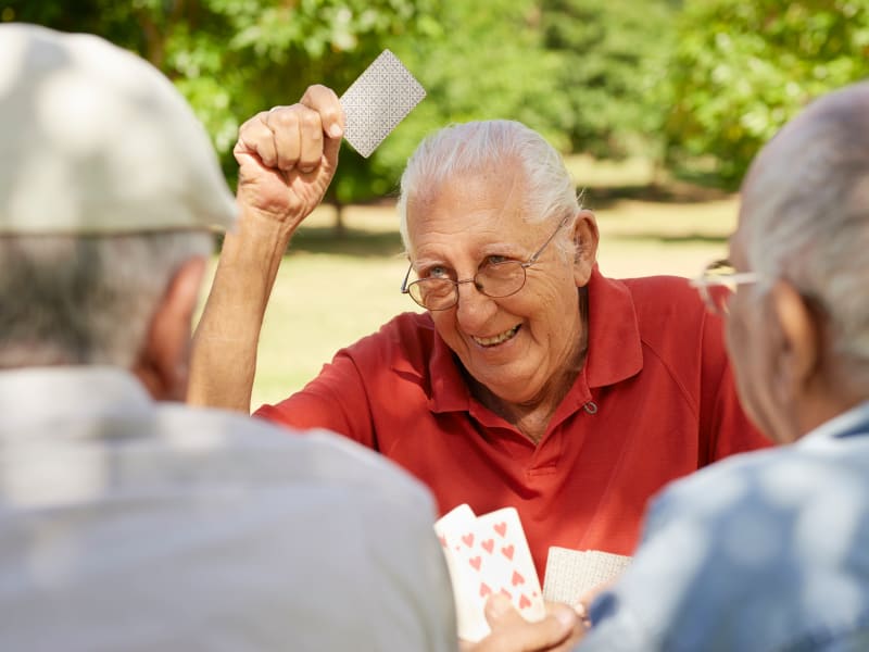 Resident playing cards at The Residences on Forest Lane in Montello, Wisconsin