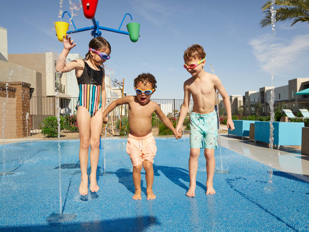 Residents playing in the pool at BB Living at Higley Park in Gilbert, Arizona
